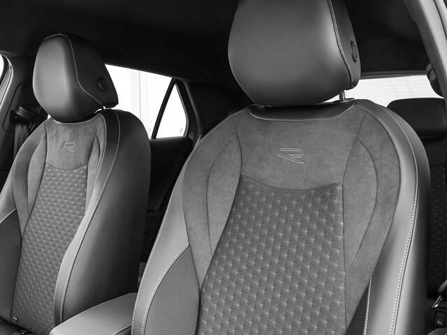 Volkswagen T-Roc R-Line First Edition 1.5 eTSI 150 PK 7 versn. DSG · Achteruitrijcamera · Draadloze telefoonlader · High-end geluidsysteem Harman Kardon · Koplampverlichting matrix-led (IQ.LIGHT) ·