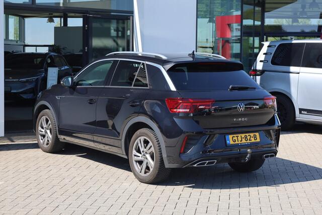 Volkswagen T-Roc 1.5 TSI R-Line Afneembare trekhaak Digital cockpit, R-Line in- en exterieur, achteruitrijcamera, navigatie, spiegel pakket, park assist, light assist, LED plus, adaptieve cruise control (acc), licht & regensensor, climatronic, draadloos Apple Carplay / An