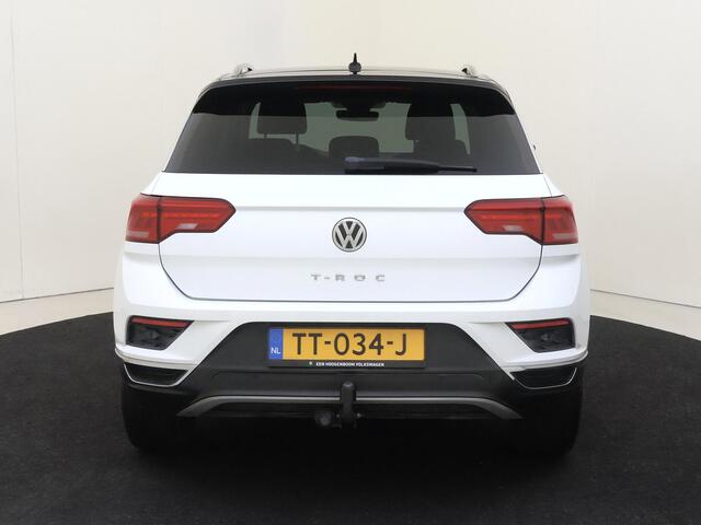 Volkswagen T-Roc 1.0 TSI Style | Trekhaak | Navigatie | Stoelverwarming | Adaptieve cruise control | Lane assist | Carplay | 3-zone airco |