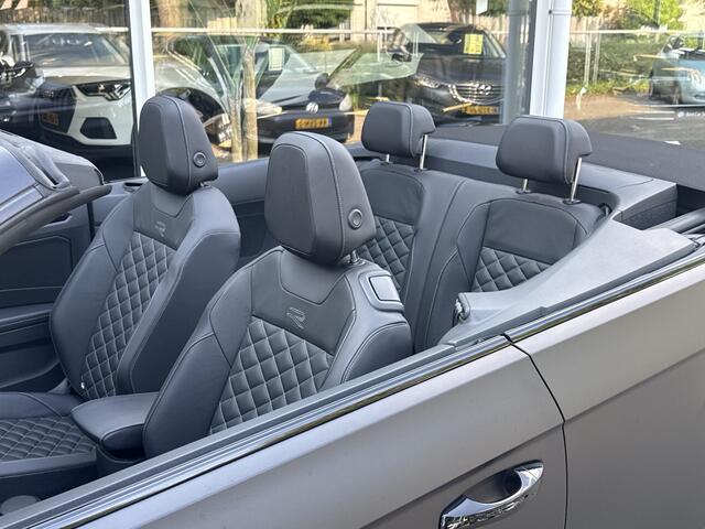 Volkswagen T-Roc Cabrio 1.5 TSI R-Line Edition Black 1/999 - Leer | Beats | IQ-light | Nav | Stuur/stoelverw. | Camera | CarPlay | Afn. trekh.