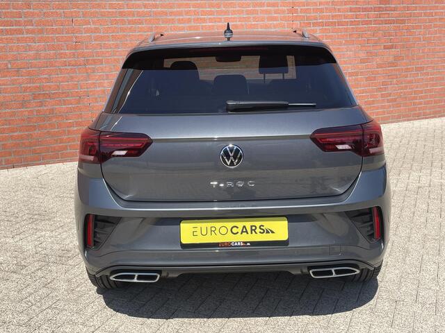Volkswagen T-Roc 1.5 TSI 150pk DSG R-Line Navigatie Apple Carplay / Android Auto Parkeersensoren Afneembare trekhaak Park Assist Adaptive Cruise Control Elektrische achterklep Stoel- en stuurverwarming Climate Control Ledverlichting Virtual Cockpit