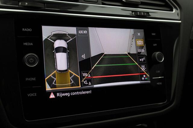 Volkswagen TIGUAN 1.4 TSI 245 pk DSG eHybrid R-Line Business+ | Panoramadak | Trekhaak | Leder | Geheugenstoelen | Adaptief onderstel | Rondomzicht camera | IQ Light