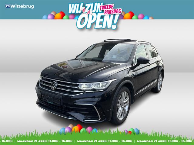 Volkswagen TIGUAN 1.4 TSI eHybrid 2x R-Line / AUTOMAAT/ PANO/ TREKHAAK/ 2X R-LINE/ 245PK/ 20" LMV/ HEAD-UP DISPLAY/ ADAPT. CRUISE/ PARK. SENSOREN/ 360 CAMERA/ NAVI/ RIJ-MODI/ DAB/ APP-CONNECT/ BLUETOOTH/ CLIMA/ STOEL-STUUR VERWARM.