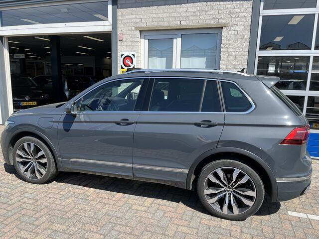 Volkswagen TIGUAN 1.4 TSI eHybrid R-Line / AUTOMAAT/ 2X R-LINE/ 245PK/ PANO/ KEYLESS/ ADAPT. CRUISE/ CLIMA 3 ZONE/ DIGITAL DASH/ NAVI/ DAB/ APP-CONNECT/ BLUETOOTH/ STOEL-STUUR VERWARM./ HEAD-UP DISPLAY/ RIJ-MODI/ PARK. SENSOREN