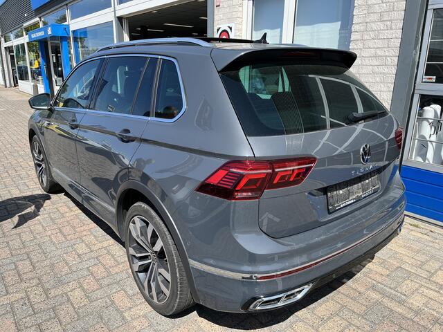 Volkswagen TIGUAN 1.4 TSI eHybrid R-Line / AUTOMAAT/ 2X R-LINE/ 245PK/ PANO/ KEYLESS/ ADAPT. CRUISE/ CLIMA 3 ZONE/ DIGITAL DASH/ NAVI/ DAB/ APP-CONNECT/ BLUETOOTH/ STOEL-STUUR VERWARM./ HEAD-UP DISPLAY/ RIJ-MODI/ PARK. SENSOREN