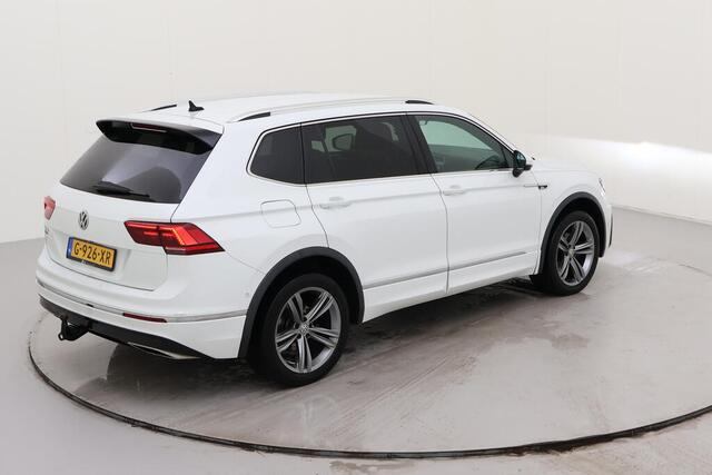 Volkswagen TIGUAN Allspace 1.5 TSI 2x R-Line 7p. / AUTOMAAT/ CAMERA/ PARK. SENSOREN/ TREKHAAK/ LEDER/ VIRTUAL COCKPIT/ ELEK. ACHTERKLEP/ LED/ NAVI/ CLIMA/ 19" LMV