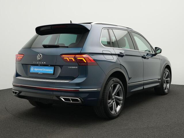 Volkswagen TIGUAN 1.4 TSI 245 pk DSG eHybrid R-Line Business+ | Panoramadak | Trekhaak | Leder | Geheugenstoelen | Rondomzicht camera | IQ Light | Stuur-/achterbankverwarming