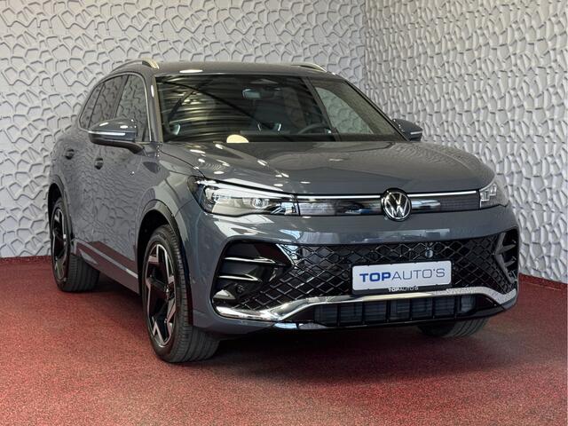 Volkswagen TIGUAN 1.5 eTSI R-LINE 3D LED GRILL 19''LMV ERGO.STOEL MASSAGE DESIGN PACK STOEL/STUUR VERW TREKHAAK 09/2024 "Volkswagen rijden begint bij Topautos.nl - 75 topmodellen direct op voorraad!"