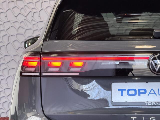 Volkswagen TIGUAN 1.5 eTSI R-LINE 3D LED GRILL 19''LMV ERGO.STOEL MASSAGE DESIGN PACK STOEL/STUUR VERW TREKHAAK 09/2024 "Volkswagen rijden begint bij Topautos.nl - 75 topmodellen direct op voorraad!"