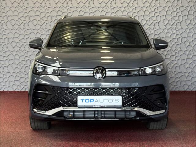 Volkswagen TIGUAN 1.5 eTSI R-LINE 3D LED GRILL 19''LMV ERGO.STOEL MASSAGE DESIGN PACK STOEL/STUUR VERW TREKHAAK 09/2024 "Volkswagen rijden begint bij Topautos.nl - 75 topmodellen direct op voorraad!"