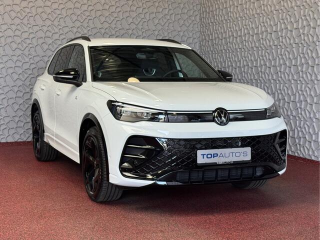 Volkswagen TIGUAN 1.5 eTSI R-LINE 3D LED GRILL 19''LMV ERGO.STOEL MASSAGE ELEK.KLEP DESIGN PACK STOEL/STUUR VERW TREKHAAK 09/2024 "Volkswagen rijden begint bij Topautos.nl - 75 topmodellen direct op voorraad!"