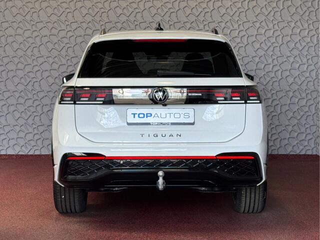 Volkswagen TIGUAN 1.5 eTSI R-LINE 3D LED GRILL 19''LMV ERGO.STOEL MASSAGE ELEK.KLEP DESIGN PACK STOEL/STUUR VERW TREKHAAK 09/2024 "Volkswagen rijden begint bij Topautos.nl - 75 topmodellen direct op voorraad!"
