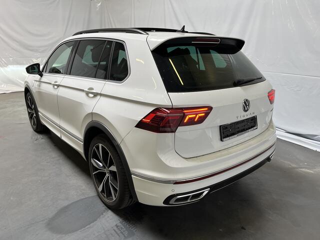 Volkswagen TIGUAN 1.4 TSI eHybrid R-Line / AUTOMAAT/ 245 PK/ PANO/ LEER/ STUUR+STOEL VERWARM./ ELEK. ACHTERKLEP/ TREKHAAK/ PARK.SENSOR.V+A/ CAMERA/ DCC/ APP-CONNECT/ MEMORY SEATS/ ACC/ NAVI/ CLIMA/ DAB/ 20'' LMV