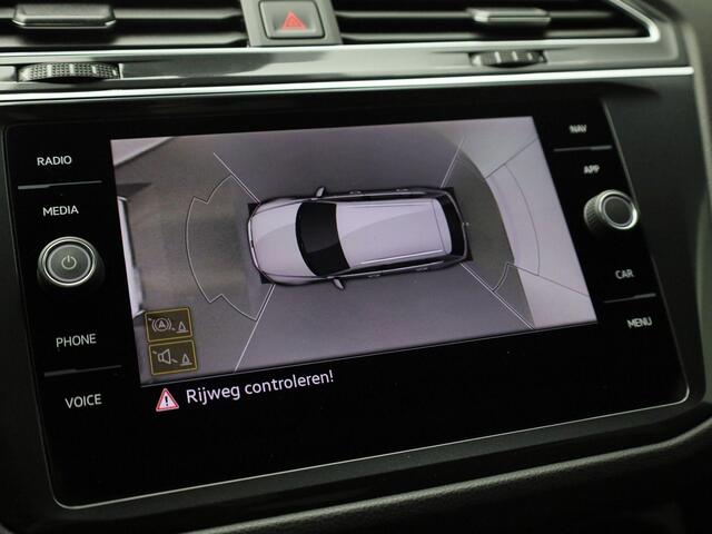 Volkswagen TIGUAN 1.4 TSIeHybrid 180kW/245PK R-Line DSG · Panoramadak · Leder · Trekhaak
