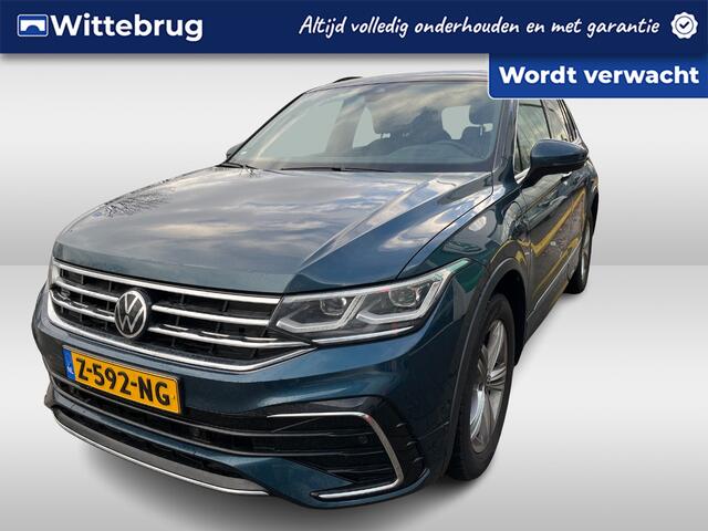 Volkswagen TIGUAN 1.4 TSI eHybrid R-Line Business+ / Pano / Head-up / Camera / Parkeersensoren V+A / Navigatie / App connect / Zwenkbare trekhaak /