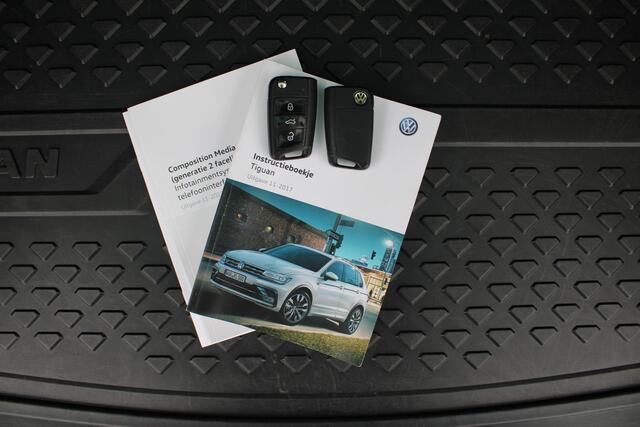 Volkswagen TIGUAN 1.4 TSI Comfortline Business | Schuif/kanteldak | Adapt. Cruise | Trekhaak | Verw. Voorstoelen | DAB | 20" LMV |