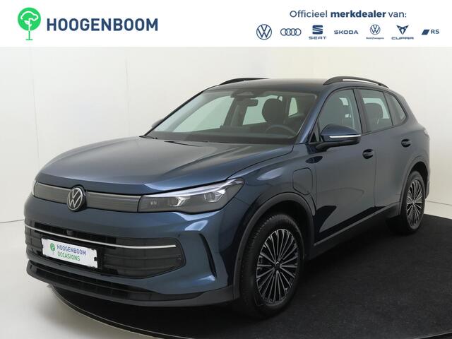 Volkswagen TIGUAN 1.5 eHybrid Life Edition | SoH 98% | Trekhaak | Adaptieve demping systeem | 360 camera | Head-up display | 3-zone airco | Dodehoek detectie | Adaptieve cruise control | Stoel- en stuurwielverwarming |