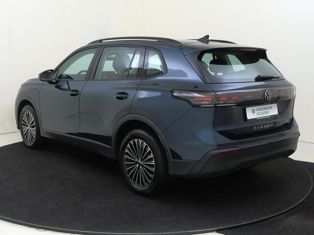 Volkswagen TIGUAN 1.5 eHybrid Life Edition | SoH 98% | Trekhaak | Adaptieve demping systeem | 360 camera | Head-up display | 3-zone airco | Dodehoek detectie | Adaptieve cruise control | Stoel- en stuurwielverwarming |