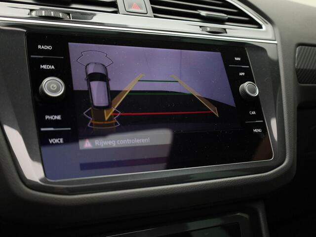 Volkswagen TIGUAN 1.4TSIeHybrid 180kW/245PK R-Line DSG · Panoramadak · Trekhaak · Apple/Android Car Play · Camera ·
