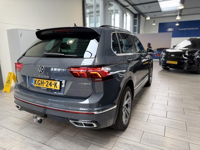 Volkswagen TIGUAN 1.4 TSI eHybrid 204 pk R-Line Business+ | Trekhaak | Leder | IQ-LED | Adapt. cruise | El. verst. stoel + geh | 100% dealer onderh. | El. a. klep
