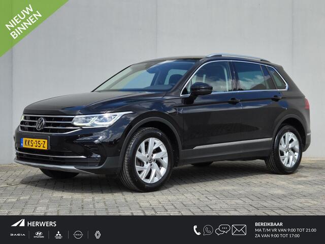 Volkswagen TIGUAN 1.4 TSI eHybrid R-Line Business+ / Elektrische trekhaak / Trekgewicht 1.800 kg / Rondomzicht camera / Stuur- & Stoelverwarming / Elektrische achterklep / Voorstoelen met massage functie / Draadloze telefoon lader /