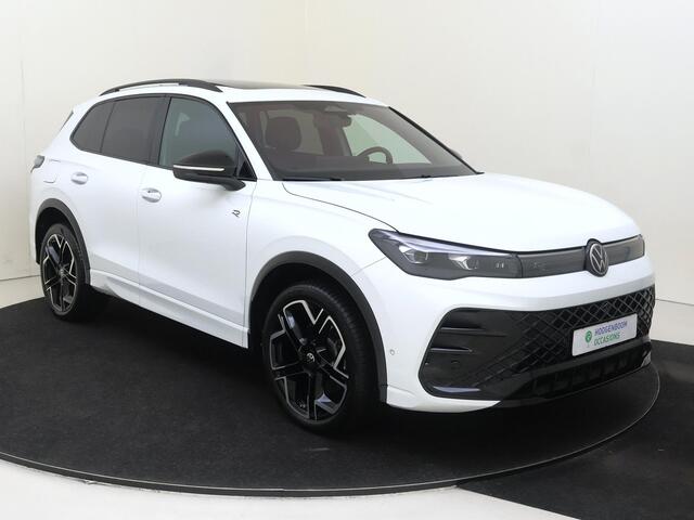 Volkswagen TIGUAN 1.5 eHybrid R-Line Edition | SoH 99% | Panoramadak | Lederen bekleding 'Varenna' | Trekhaak | Harman/kardon | Head-up display | Adaptieve demping | Black style | Stoelventilatie voor |