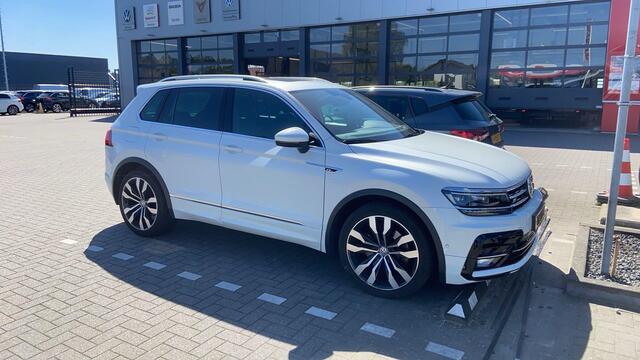 Volkswagen TIGUAN 2.0 TSI 4Motion Highline NL auto 1e eigenaar door ons geleverd en onderhouden DYNaudio R Line in en exterieur 20" Suzuka panoramadak discover pro navigatie LED Plus adaptief keyless entry elektrische achterklep spiegel pakket winterpakket verwarmbare voor