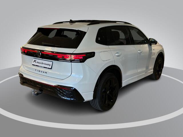 Volkswagen TIGUAN 1.5eHybrid 150kW/204PK R-Line Black Style · Leder · Harman Kardon · Panoramadak · Trekhaak · 360°Camera + Parkeersensoren · Garantie t/m 11-05-2030 of 100000km.