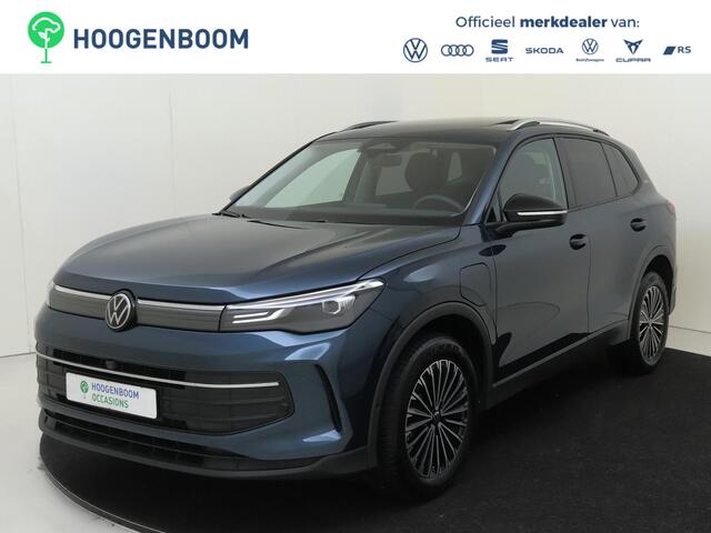 Volkswagen TIGUAN 1.5 eHybrid Life | SoH 98% | Panoramadak | Trekhaak | 360 camera | Adaptieve demping | Parkeerassistent | Dodehoek detectie | Stoel- en stuurwielverwarming |
