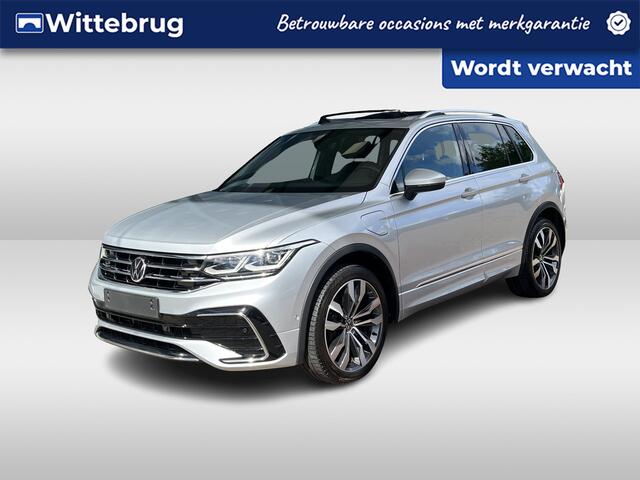 Volkswagen TIGUAN 1.4 TSI eHybrid R-Line / AUTOMAAT/ 245 PK/ 2X R-LINE/ PANO/ TREKHAAK/ CAMERA/ KEYLESS/ IQ. LIGHT/ DCC/ DODE HOEK/ STOELVERWARM. V&A/ STUURVERWARM./ ADAPT. CRUISE/ APP CONNECT/ NAVI/ 20" LMV