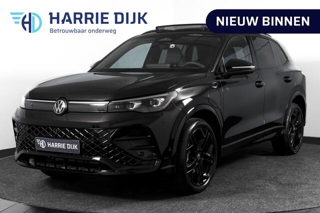 Volkswagen TIGUAN 1.5 eHybrid R-Line Edition 272 PK | Black Style | 15 inch Navi | Elek. Trekhaak | IQ Light | S/K-Panodak | Dig. Cockpit | Adapt. Cruise | Stoel-+Stuurverw. | 360 Camera | NAV + App. Connect | ECC | Elek. Klep | LM 20" | 4535