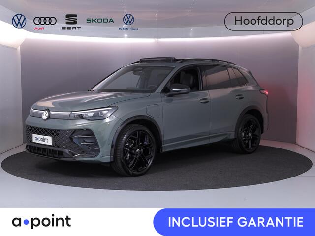 Volkswagen TIGUAN 1.5 eHybrid R-Line Edition 272 pk Automaat (DSG) | Verlengde garantie | Navigatie | Panoramadak | Trekhaak (wegklapbaar) | Achteruitrijcamera | Lederen bekleding | Stoelverwarming/ventilatie | R-Line |