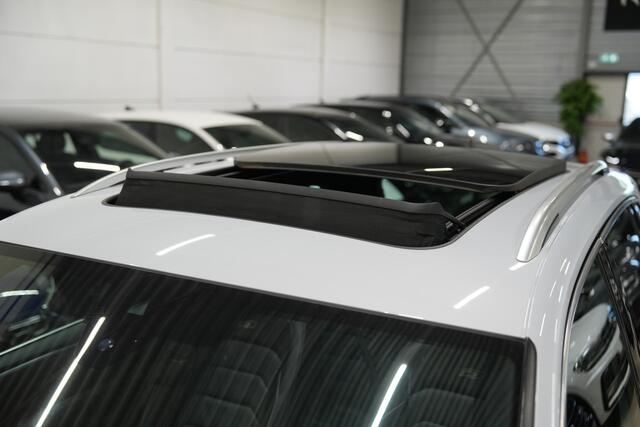 Volkswagen TIGUAN 2.0 TSI 4Motion 220PK 3x R-Line * Pano - Dynaudio - 360° Cam - Leder - Memory - Keyless - White Silver *