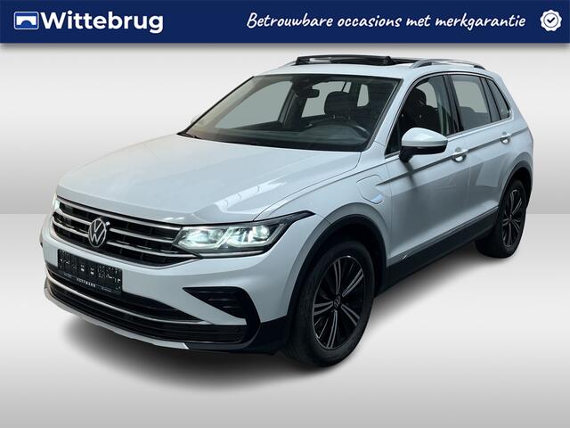 Volkswagen TIGUAN 1.4 TSI eHybrid Elegance / AUTOMAAT/ PANO/ TREKHAAK/ PARK.SENSOR.V+A/ CAMERA/ STUUR+STOELVERWARM./ APP-CONNECT/ ACC/ ELEK.ACHTERKLEP/ DIGITAL DASH/ NAVI/ DAB/ CLIMA/ IQ.LIGHT