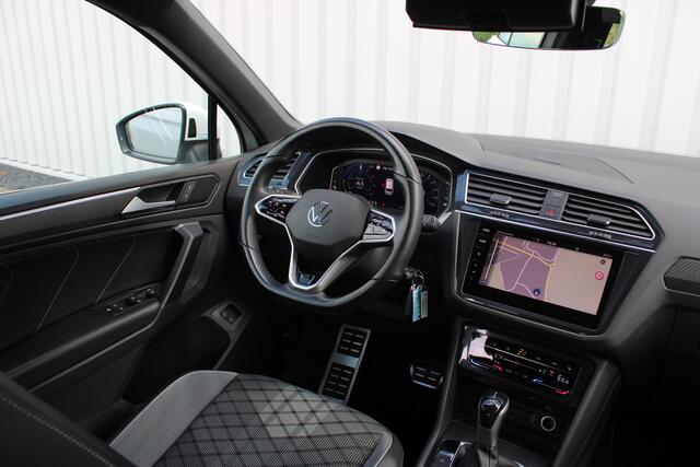 Volkswagen TIGUAN 1.4 TSI eHybrid R-Line Business+ | Incl. 12 maanden garantie | SOH 92% | Stoel/stuurverwarming | Parkeercamera | Wegklapbare trekhaak | DAB radio | Apple carplay/Android auto | 100% dealer onderhouden |