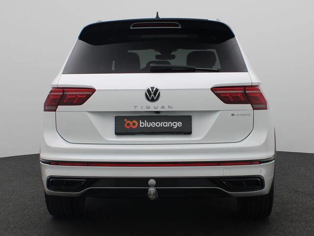 Volkswagen TIGUAN 1.4 TSI eHybrid R-Line Business 245PK DSG Panoramadak, Trekhaak, Leder, Memorystoel, 360gr. Camera, Black Style, 20" LM Velgen, Matrix-LED Verlichting, Stoel-stuurverwarming, DCC