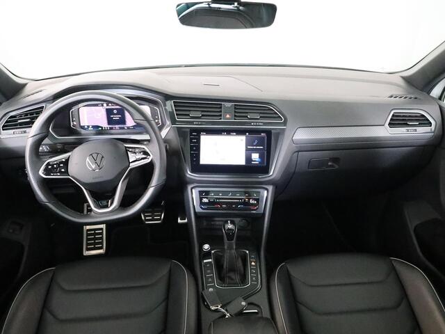 Volkswagen TIGUAN 1.4 TSI eHybrid R-Line Business 245 pk Automaat (DSG) | Navigatie | Panoramadak | Park assist | Rondomzicht camera | Head-up display | Lederen bekleding | Elektr. voorstoelen met geheugen | R-Line |