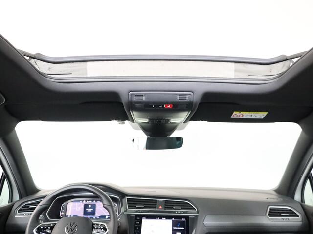 Volkswagen TIGUAN 1.4 TSI eHybrid R-Line Business 245 pk Automaat (DSG) | Navigatie | Panoramadak | Park assist | Rondomzicht camera | Head-up display | Lederen bekleding | Elektr. voorstoelen met geheugen | R-Line |