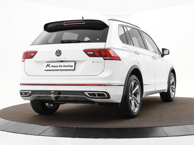 Volkswagen TIGUAN 1.4 TSI eHybrid 245pk DSG R-Line Business · Camera · Inklap. Trekhaak · Dodehoeksensor · Parkeer Assistent · Stuur- & Stoelverwarming · 19"Velgen ·
