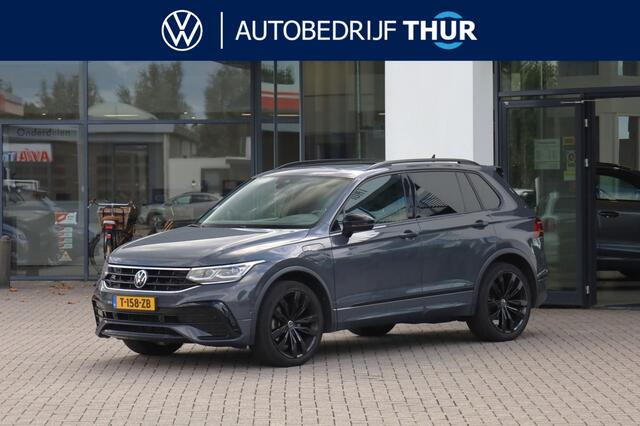 Volkswagen TIGUAN 1.4 TSI eHybrid R-Line Business+ 245PK / 180kW DSG, Door ons geleverd en onderhouden, LED Matrix (IQ.Lights), wegklapbare trekhaak, achteruitrijcamera (Rear View), elektrisch verstelbare bestuurdersstoel met geheugenfunctie, verwarmbaar multifunctioneel lederen stuurwiel, verwarmbare voorstoelen, verwarmbare achterbank, lederen bekleding, panoramadak, 20" 'Suzuka' LMV, Black Style pakket, navigatie, elektrische achterklep, keyless go & entry, adaptieve cruise control (ACC), elektrisch verstel-, verwarm- en inklapbare buitenspiegels, 3-zone climatronic, Apple Carplay & Android Auto, parkeerassistent (Park Assist), draadloze telefoonlader etc.