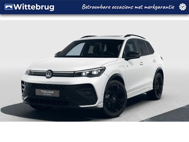 Volkswagen TIGUAN 1.5 eHybrid 272PK DSG R-Line Edition / Resterende Fabrieksgarantie tot 1-10 2029 / Black Style / Trekhaak / Leer / Panoramadak / 20'' LMV / VW
