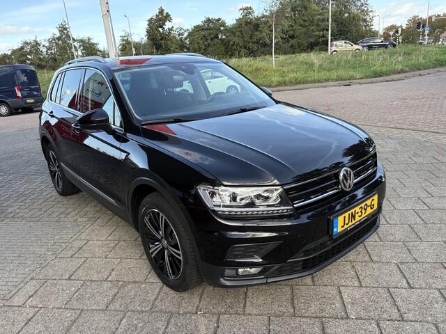 Volkswagen TIGUAN 1.4 TSI 4Motion Highline | Navi | Trekhaak | Camera | 92.007 km Dealeronderhouden