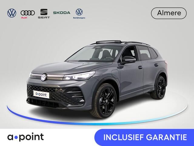 Volkswagen TIGUAN 1.5 eHybrid R-Line Edition 204 pk Automaat (DSG) | Verlengde garantie | Navigatie | Panoromadak | Trekhaak (wegklapbaar) | Parkeersensoren (Park assist) | Rondomzicht camera | Stoelverwarming | R-Line |