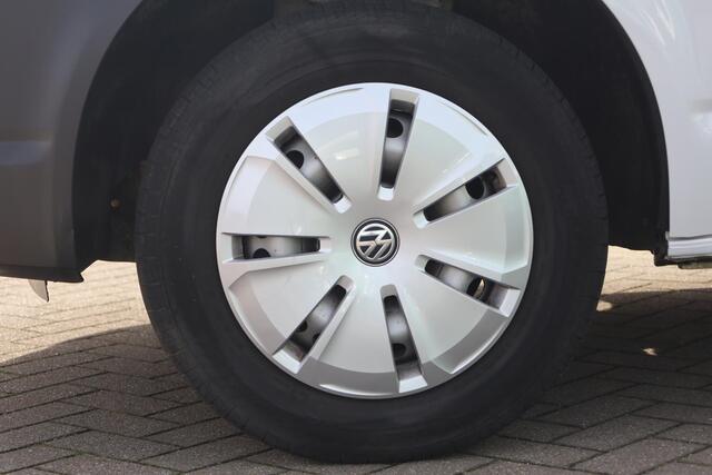 Volkswagen TRANSPORTER 2.0 TDI L1H1 Economy 84PK / 62kW, Elektrisch verstel- en verwarmbare buitenspiegels, airco, trekhaak, comfortstoel, armsteun, Apple Carplay / Android Auto, 3-zits, achterdeuren met ruiten, nieuw door ons geleverd en onderhouden