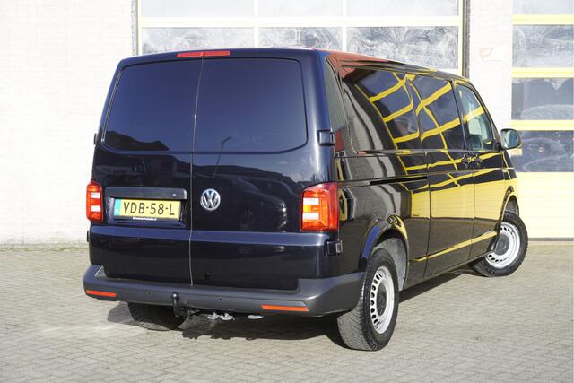 Volkswagen TRANSPORTER 2.0 TDI L2H1 Comfortline Plus BJ2019 Pdc | Navi | Trekhaak | Verwarmd voorruit | App-Connect | Airco | Cruise control | Getint glas | Achterdeuren | Tussenschot | Zijdeur