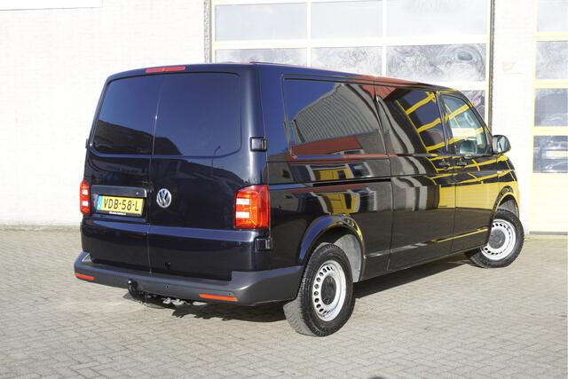 Volkswagen TRANSPORTER 2.0 TDI L2H1 Comfortline Plus BJ2019 Pdc | Navi | Trekhaak | Verwarmd voorruit | App-Connect | Airco | Cruise control | Getint glas | Achterdeuren | Tussenschot | Zijdeur