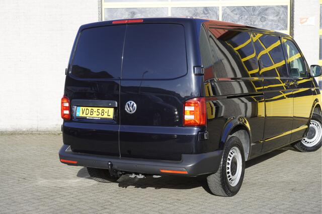 Volkswagen TRANSPORTER 2.0 TDI L2H1 Comfortline Plus BJ2019 Pdc | Navi | Trekhaak | Verwarmd voorruit | App-Connect | Airco | Cruise control | Getint glas | Achterdeuren | Tussenschot | Zijdeur