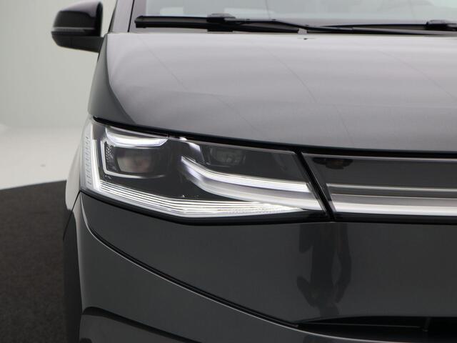 Volkswagen TRANSPORTER Bulli Edition L2 1.5 eHybrid EU6 180 kW (245pk) 31 Volkswagen Multivan Bulli Edition L2 1.5 eHybrid EU6 180 kW (245pk) 31 | 700122 | Vis-a-vis stoelopstelling met 7 zitplaatsen | Elec. achterklep } elec trekhaak |