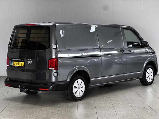 Volkswagen TRANSPORTER 2.0 TDI L2H1 Business/ Trekhaak/ 3-Zitplaatsen voor/ Zij-Schuifdeur Rechts/ Apple + Android/ Airco/ Cruise/ Elek. pakket/ Bluetooth/ Armsteun/ PDC/ Dagrijverl.