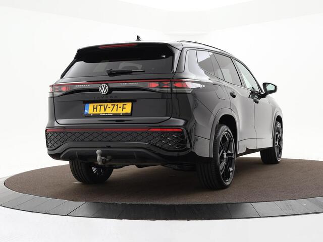 Volkswagen Tayron 1.5 eHybrid 204pk DSG R-Line Edition · SOH 100% · Panoramadak · 360 Camera · Inklap. Trekhaak · Matrix LED · Stuur- & Stoelverwarming + Massage · Garantie t/m 09-07-2029 of 100.000km